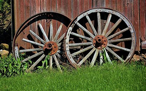 Antique Wagon Wheels Photograph by Nancy Jenkins - Fine Art America