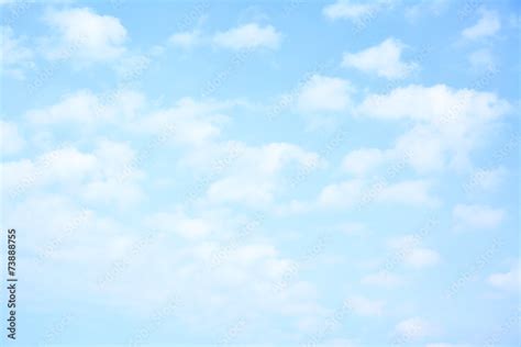 Light blue sky with clouds Stock Photo | Adobe Stock