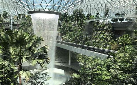 You Can Hike Through an Indoor Forest Past a 130-foot Waterfall — All In Singapore's Changi Airport