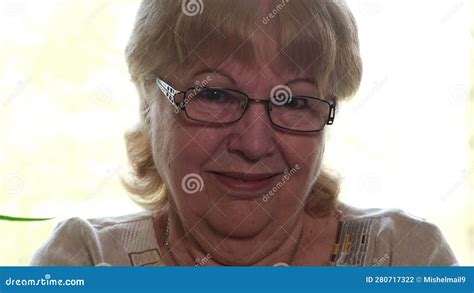 Face Portrait of Pretty Old Woman in Glasses Smiling Looking at Camera Stock Footage - Video of ...