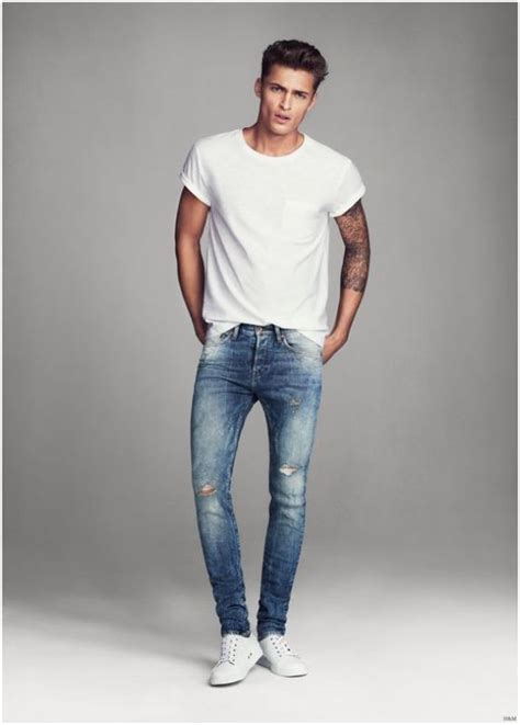 Picture Of Distressed Skinny Jeans With A Plain White Tee