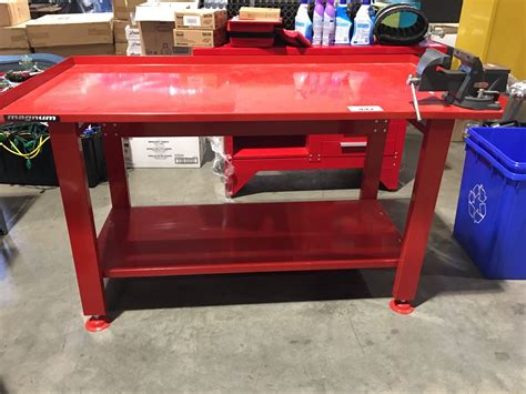 MAGNUM HEAVY DUTY STEEL WORK BENCH 5' X 32" WITH ATTACHED VISE - Able Auctions