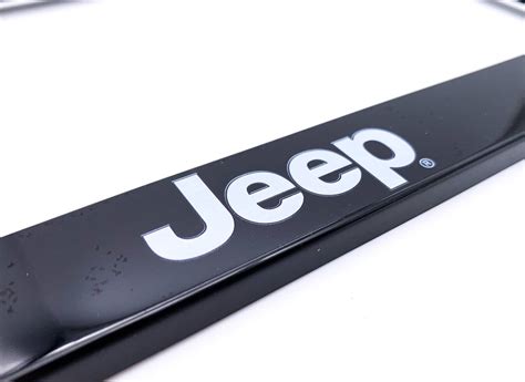 Black Plastic License Plate Frame w/ White Jeep Script Emblem Logo - GoodSpeed USA