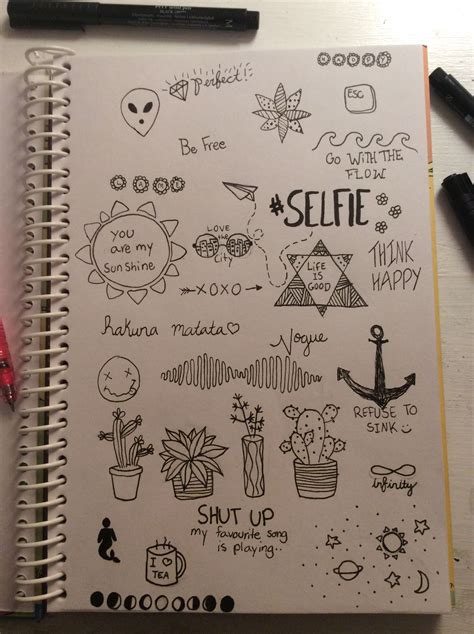 Creative Doodles in an Open Notebook