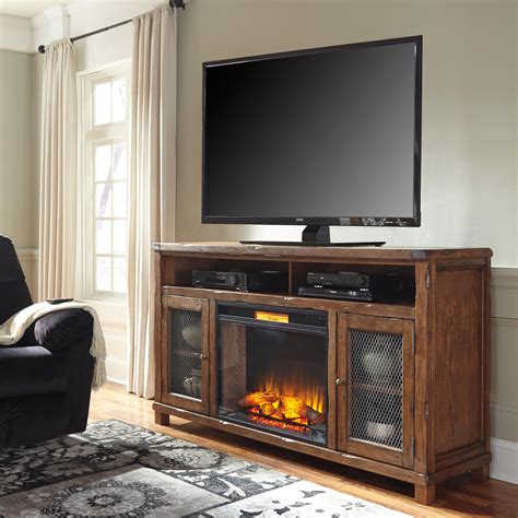 Signature Design by Ashley Tamonie Rustic Mango Veneer XL TV Stand with Electric Fireplace ...