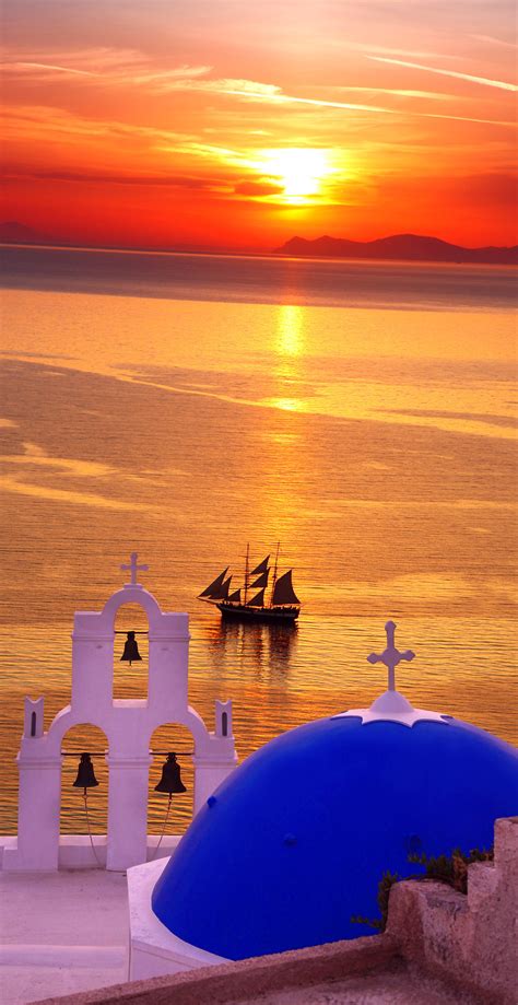 The Living... — Amazing Santorini sunset with churches and sea...