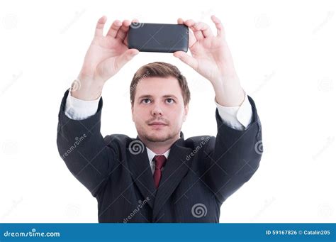 Business Person Taking A Selfie Using Phone Camera Or Smartphone Stock Photo - Image: 59167826