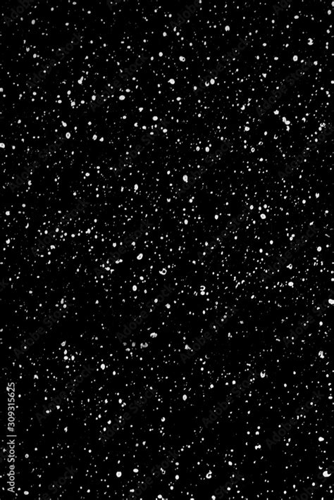 Chaotic white star bokeh on a isolated black background. falling blurry bokeh snow overlay ...