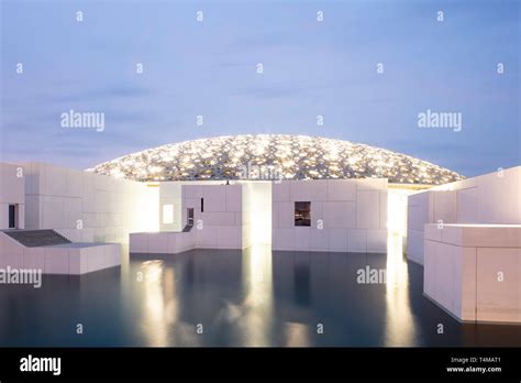 SAADIYAT ISLAND, ABU DHABI, UNITED ARAB EMIRATES - April 12, 2019: The Louvre Abu Dhabi on ...