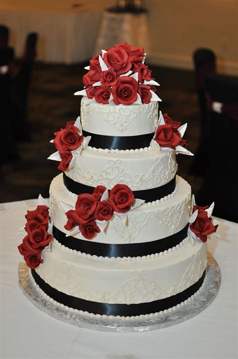 Konditor Meister Wedding Cake with Red Sugar Roses and Black Ribbon