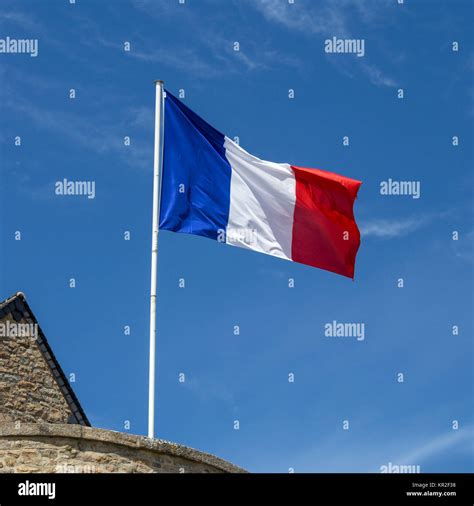 French flag waving in the wind Stock Photo - Alamy