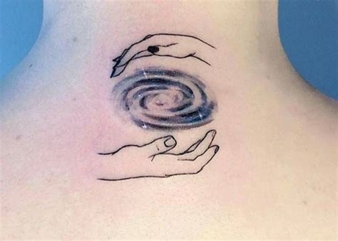 Spiral galaxy with hands tattoo | Small hand tattoos, Galaxy tattoo, Spiral tattoos