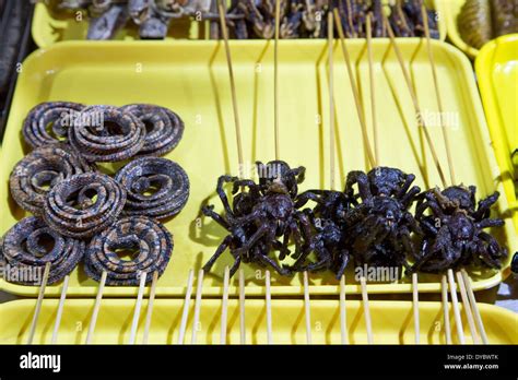 ASIA Beijing CHINA Chinese food food market snake spider Stock Photo: 68488579 - Alamy