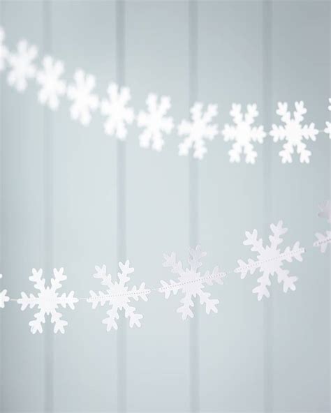 paper snowflake garland by rastall and daughters | notonthehighstreet.com