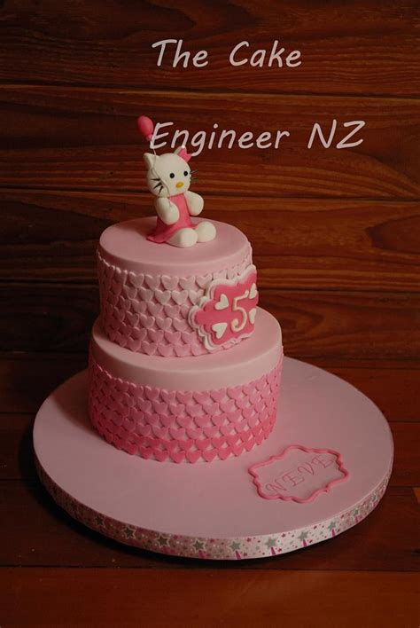 Hello Kitty pink heart cake - Decorated Cake by The Cake - CakesDecor