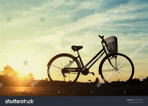 Silhouette Bicycle Sunset Background Stock Photo 1285456453 | Shutterstock