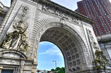 The Greek Revival triumphal arch and colonnade at the Manhattan entrance of the Manhattan Bridge ...