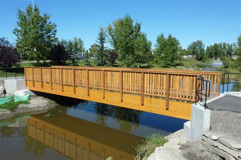 Glulam Beam Pedestrian Bridges | Custom Park & Leisure