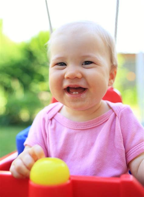 Cute Child Smiling in Swing Stock Photo - Image of laughing, person: 44407208