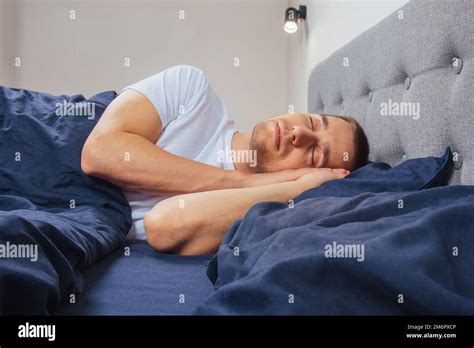 Sleeping positions man hi-res stock photography and images - Alamy