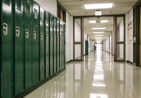 "Hallway In American High School" by Stocksy Contributor "Raymond Forbes LLC" - Stocksy