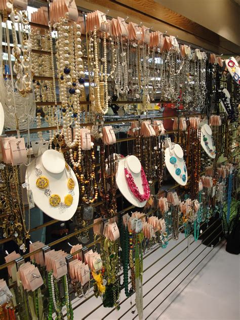 wall of jewelry on consignment | Jewelry wall display, Jewellery display, Store displays