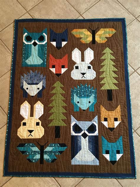 Fancy Forest baby quilt. #lifegoals | Animal baby quilt, Animal quilts, Forest baby quilt