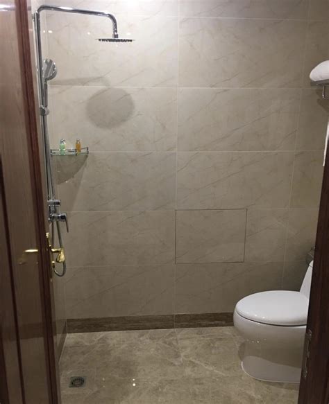 My shower/toilet combo room in a hotel in China : r/mildlyinteresting