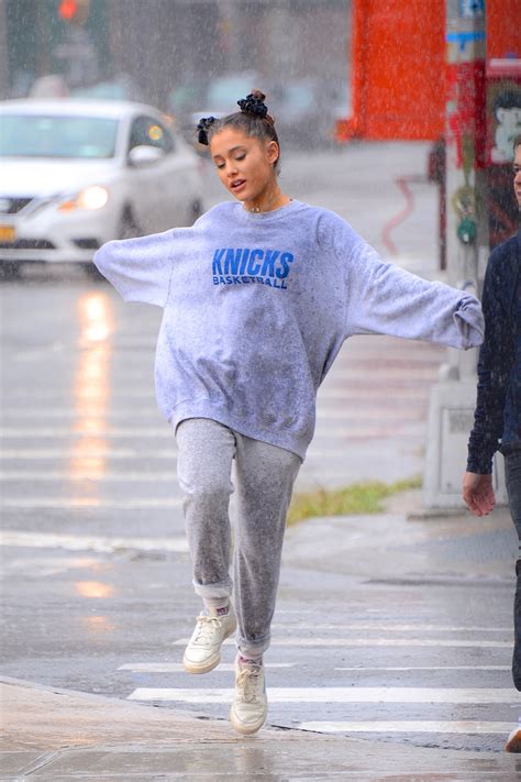 10 Practical Rainy-Day Outfits to Steal From Celebrities in 2021 | Glamour