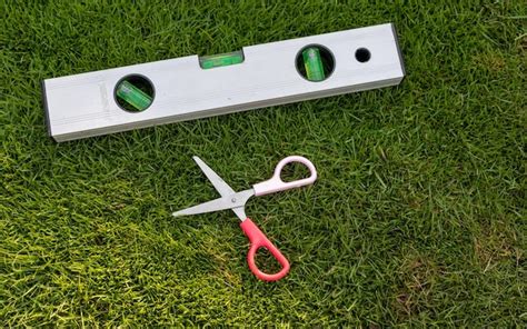 Premium Photo | Small scissors for cutting the grass