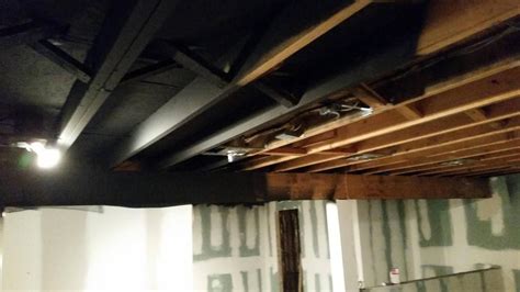 Exposed basement ceiling sprayed black DIY | Exposed basement ceiling, Basement ceiling ...