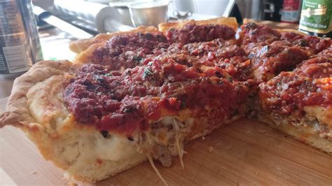 [Homemade] Chicago-style stuffed deep dish pizza. With Italian sausage layers of whole milk mozz ...