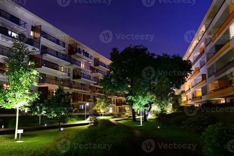 Exterior of apartment building at night 27852668 Stock Photo at Vecteezy