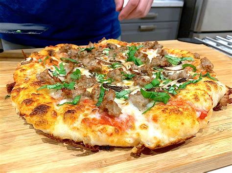 Cast Iron Pizza made with Homemade Pizza Dough : r/castiron