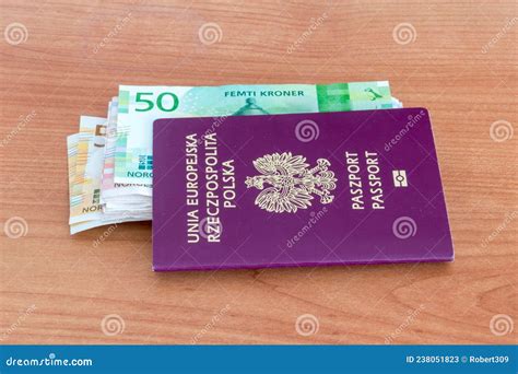 Polish Biometric Passport with Norwegian Krone NOK Banknotes on Wooden Table Stock Image - Image ...