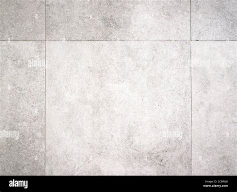 Light grey background texture of a concrete tile floor surface Stock Photo - Alamy