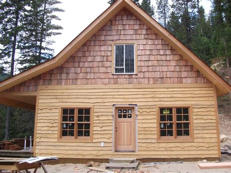 Timber framing image by Gabriel Howard on Siding / Exterior Options | Log cabin siding, House in ...