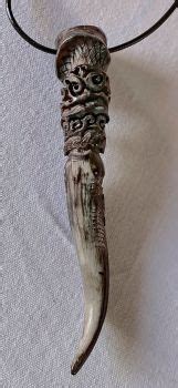 17 Wild boar Tusk carving ideas | carving, bone carving, antler jewelry