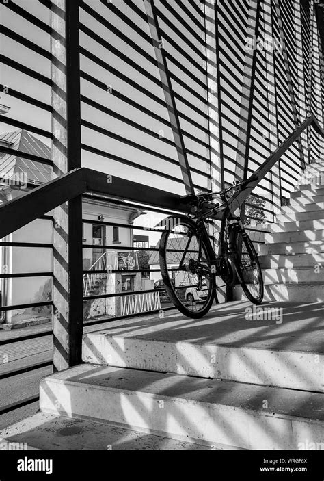 silhouette of a Bicycle against black and white stripes. Black and white art monochrome ...