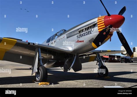 A vintage World War II-era P-51 Mustang from the Tuskegee Airmen Red Tail Squadron at Moody Air ...