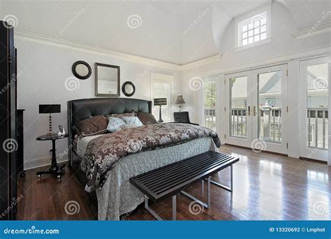 Master Bedroom In Luxury Home With Balcony Stock Photography - Image: 13320692