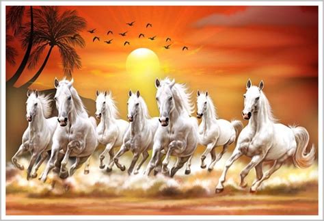 a group of white horses running across a beach at sunset with birds flying in the sky