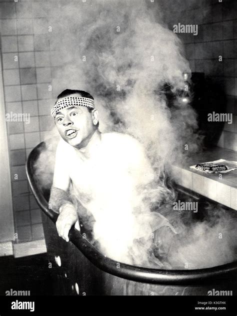 BREAKFAST AT TIFFANY'S [US 1961] MICKEY ROONEY as Mr Yunioshi Date: 1961 Stock Photo - Alamy