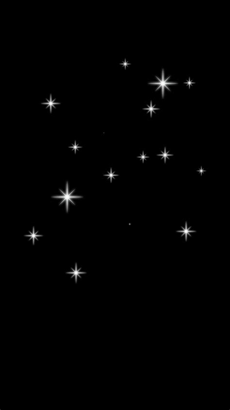 a black background with white stars in the sky