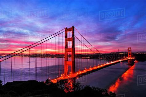 Golden Gate Bridge lit up at sunset, San Francisco, California, United States - Stock Photo ...