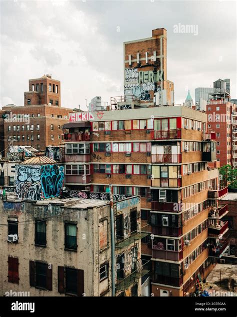 View of buildings in the Lower East Side covered in graffiti, from the Manhattan Bridge, New ...