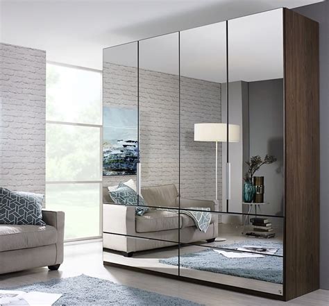 Bedroom Wardrobe Design With Mirror - A bedroom with sufficient storage space along with a ...