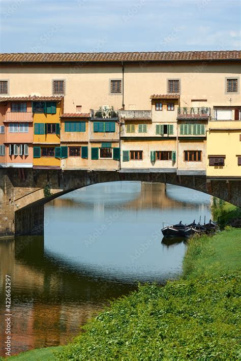 Details of Ponte Vecchio on a beautiful sunny spring day in Florence, Italy. Popular medieval ...