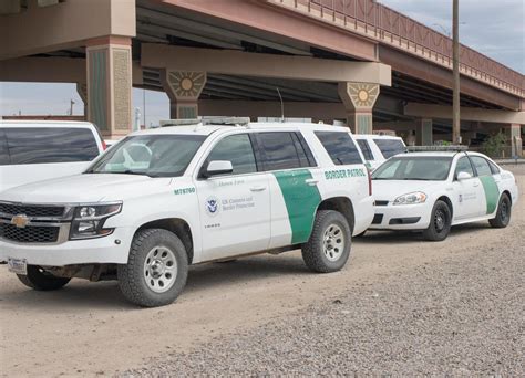 El Paso, Texas, USA September 29, 2022 Border Patrol Vehicles Parked along the US Border in ...