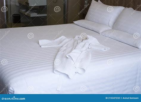 Clean White Bed in Hotel. White Comfortable Pillow on Bed in Bedroom. Bed Sheets and Pillows ...